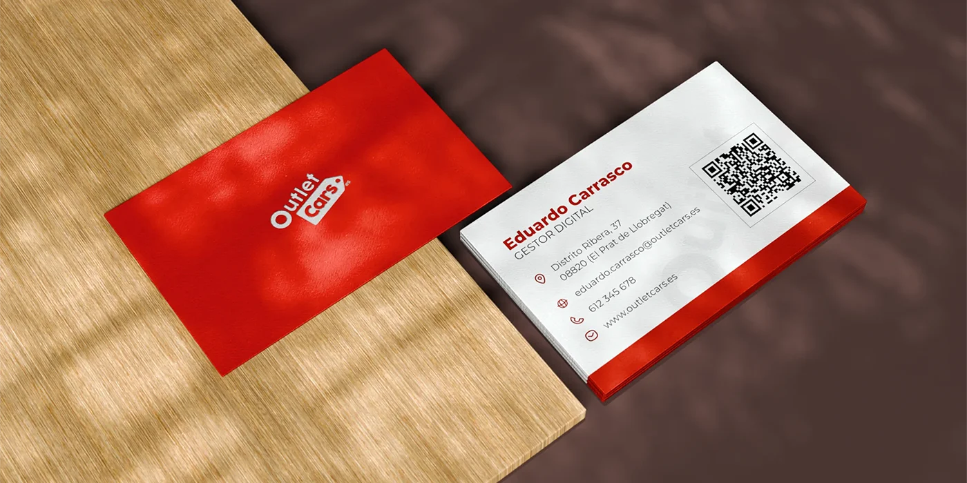 Two-sided business card design for Outlet Cars, showing a bold red front with the company logo and a white back with contact details for Eduardo Carrasco, Digital Manager, including a QR code